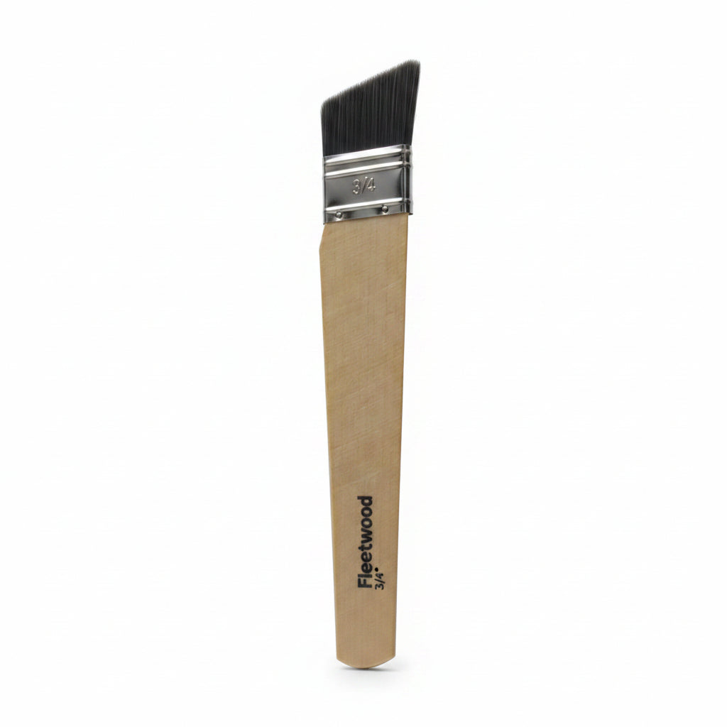 A close-up of a paint brush with a light wood handle and black bristles, showing the brand name 'Frestwood' printed on the handle.