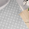 Howard Grey on Bathroom Floor