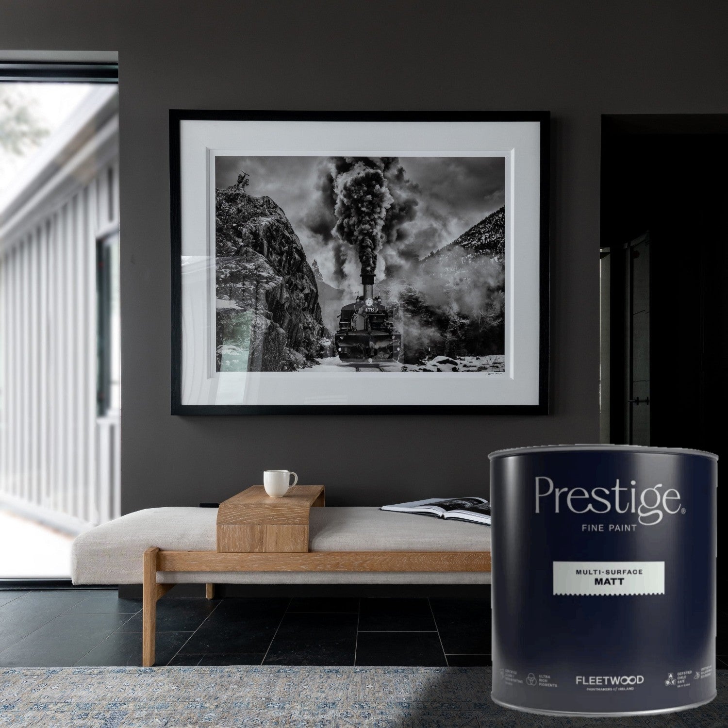 Grey room with paint tin
