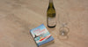 Montblanc Beige Floor Tiles with Delighful Book and Bottle of Wine