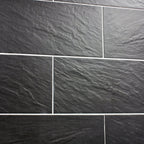Nain Black Slate Effect Tiles on a Wall